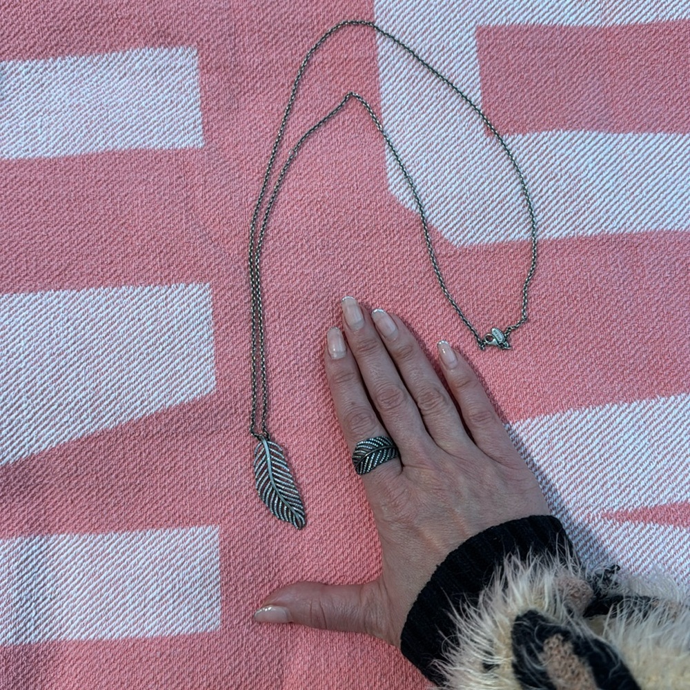 Pandora necklace& ring feather set - selling as is - needs to be cleaned